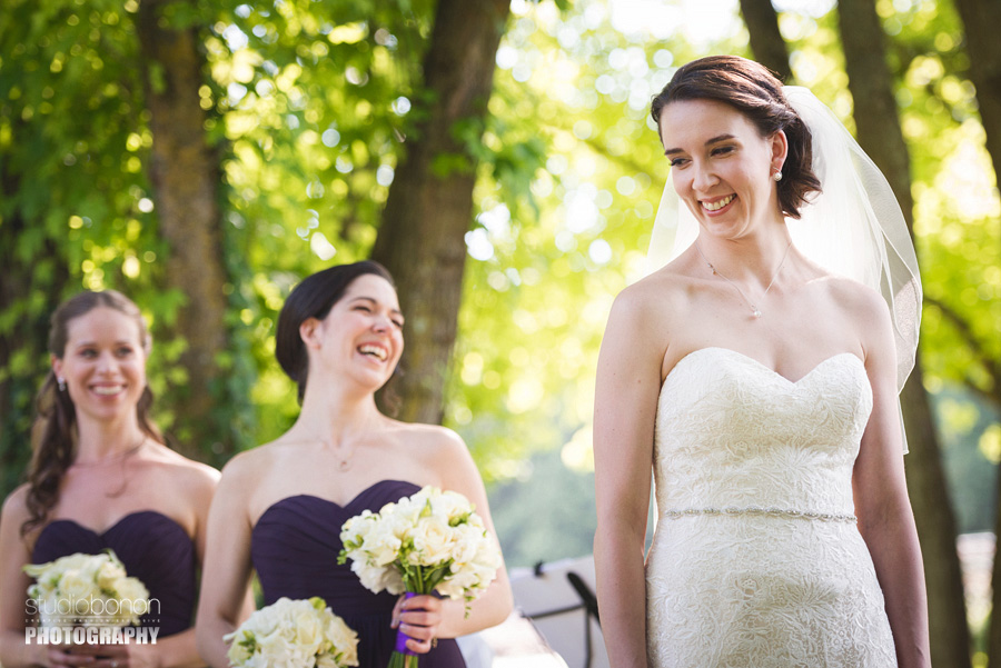 037-love-the-bride-and-the-bridesmaids-smile-during-ceremony-in-borgo-san-luigi