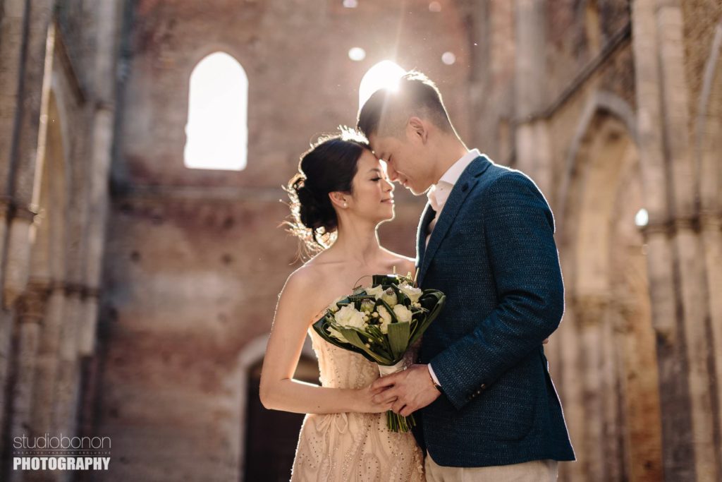 Lovely bride and groom portrait at San Galgano roofless abbey, Chiusdino Tuscany
