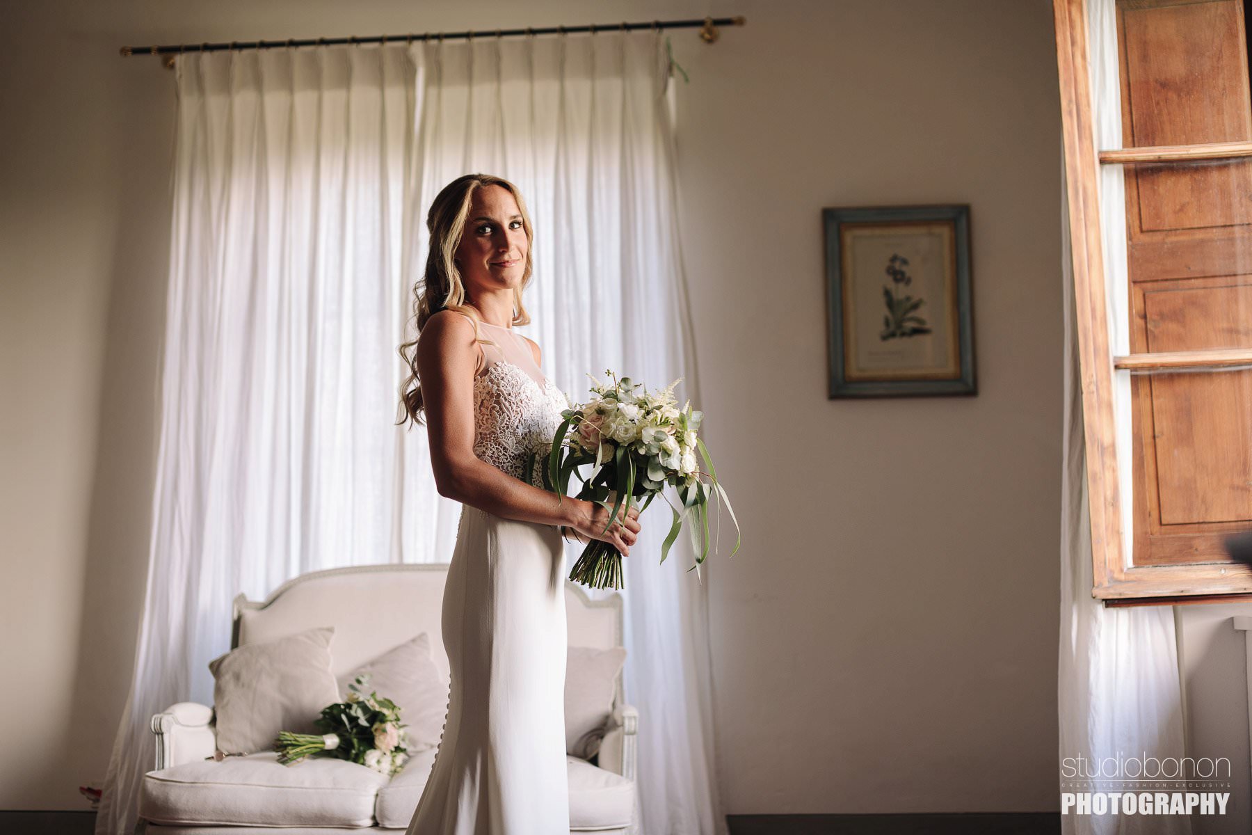 Beautiful bride in Tuscan Villa almost ready for wedding ceremony