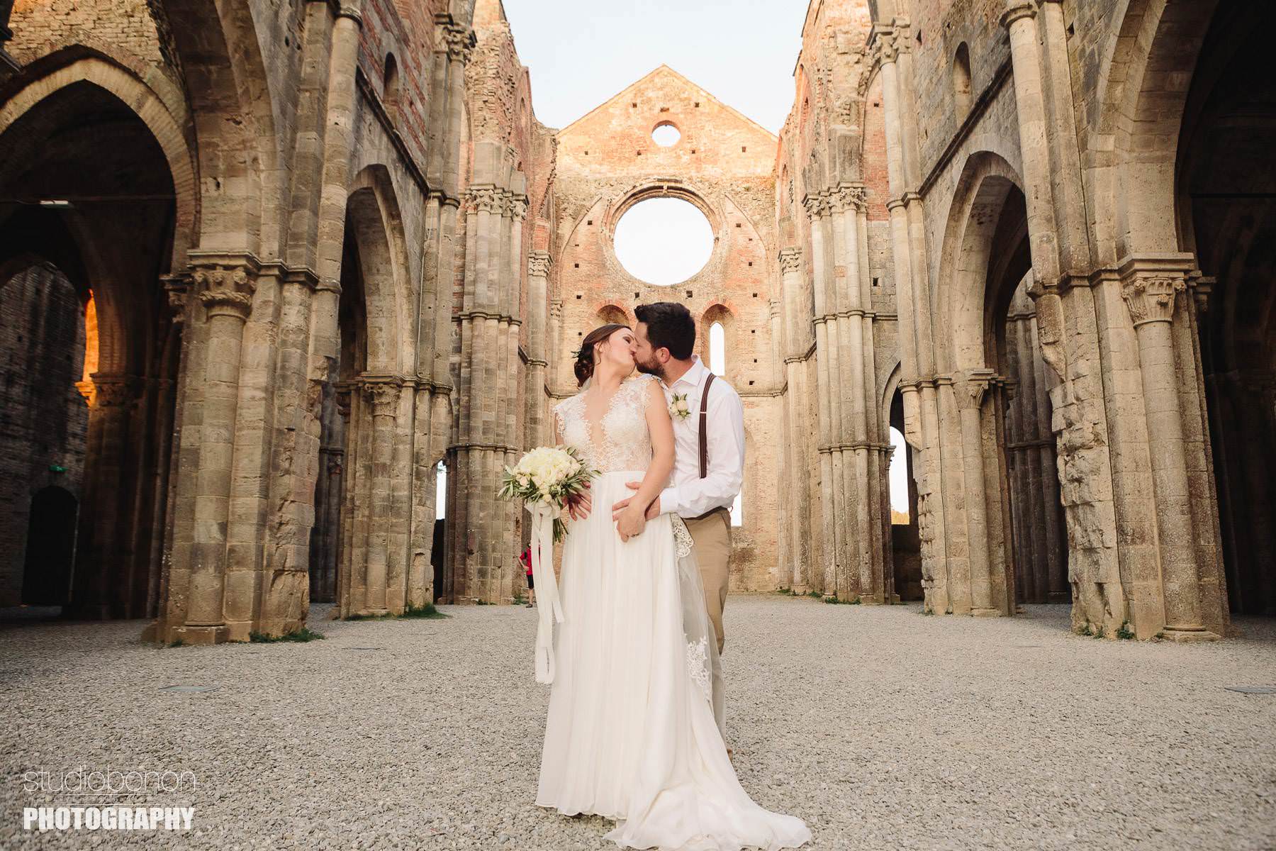 Rustic Tuscany countryside intimate wedding at Tenuta di Papena and Roofless Abbey of San Galagano